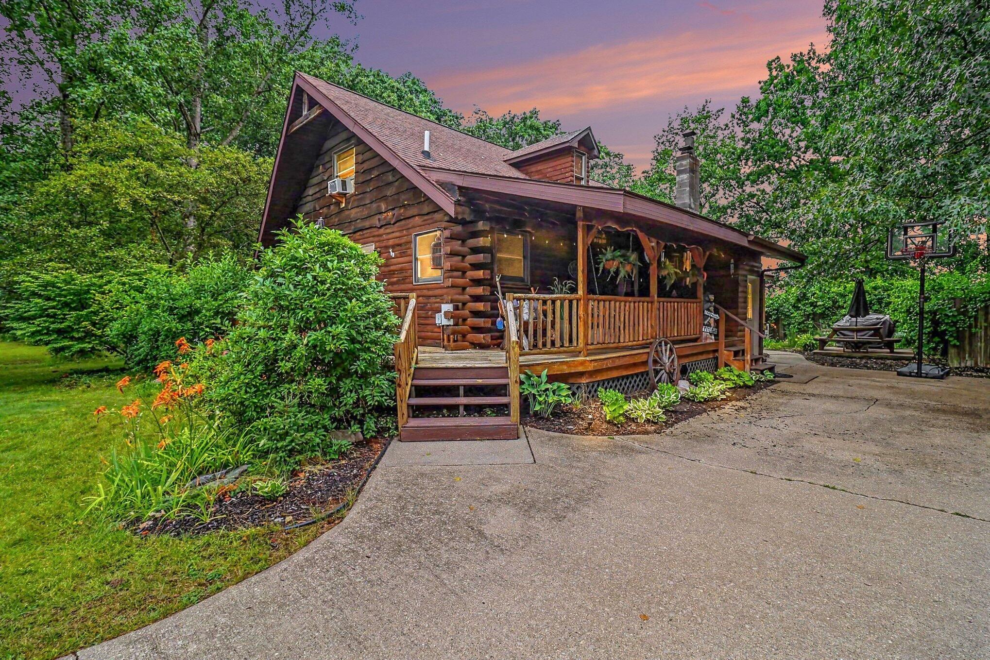 1384 Olson Road Manistee, MI 49660 - Photo 31 of 35 Exterior - Twilight