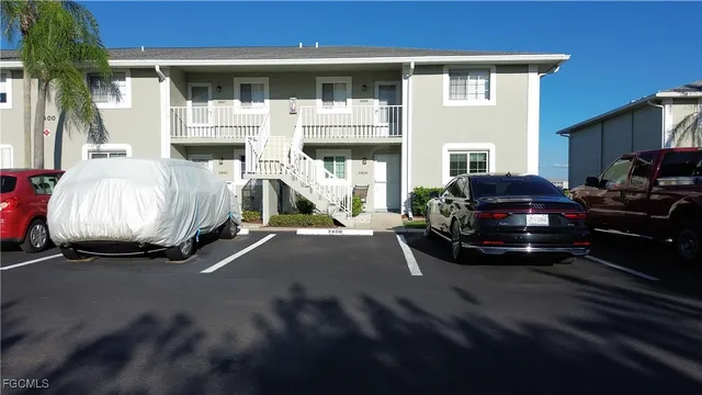 a car parked in front of a house
