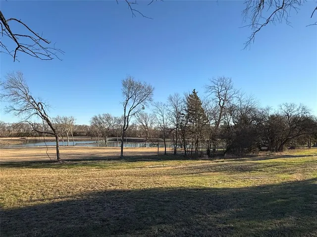 a view of swimming pool with an outdoor space and seating area