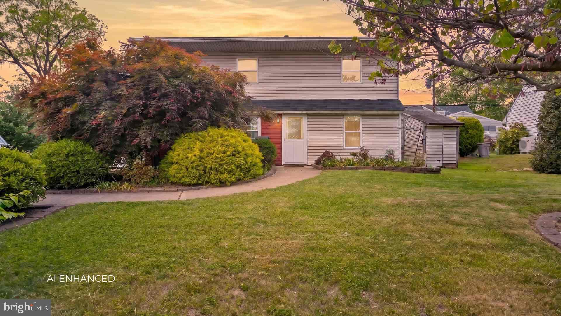 23 Cotton Road Levittown, PA 19057 - Photo 1 of 36 a front view of a house with a yard