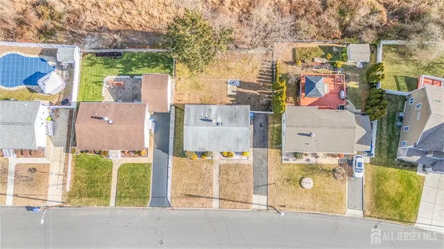 aerial view of residential houses with outdoor space