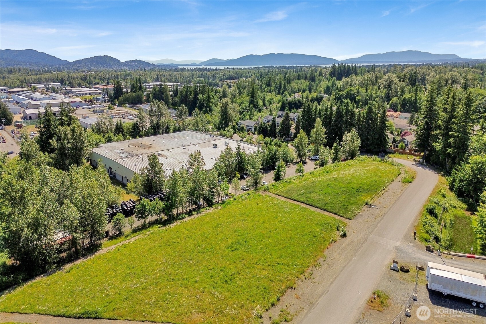 4122 Iron Gate Road Bellingham, WA 98226 - Photo 11 of 15 a view of a lake with a yard