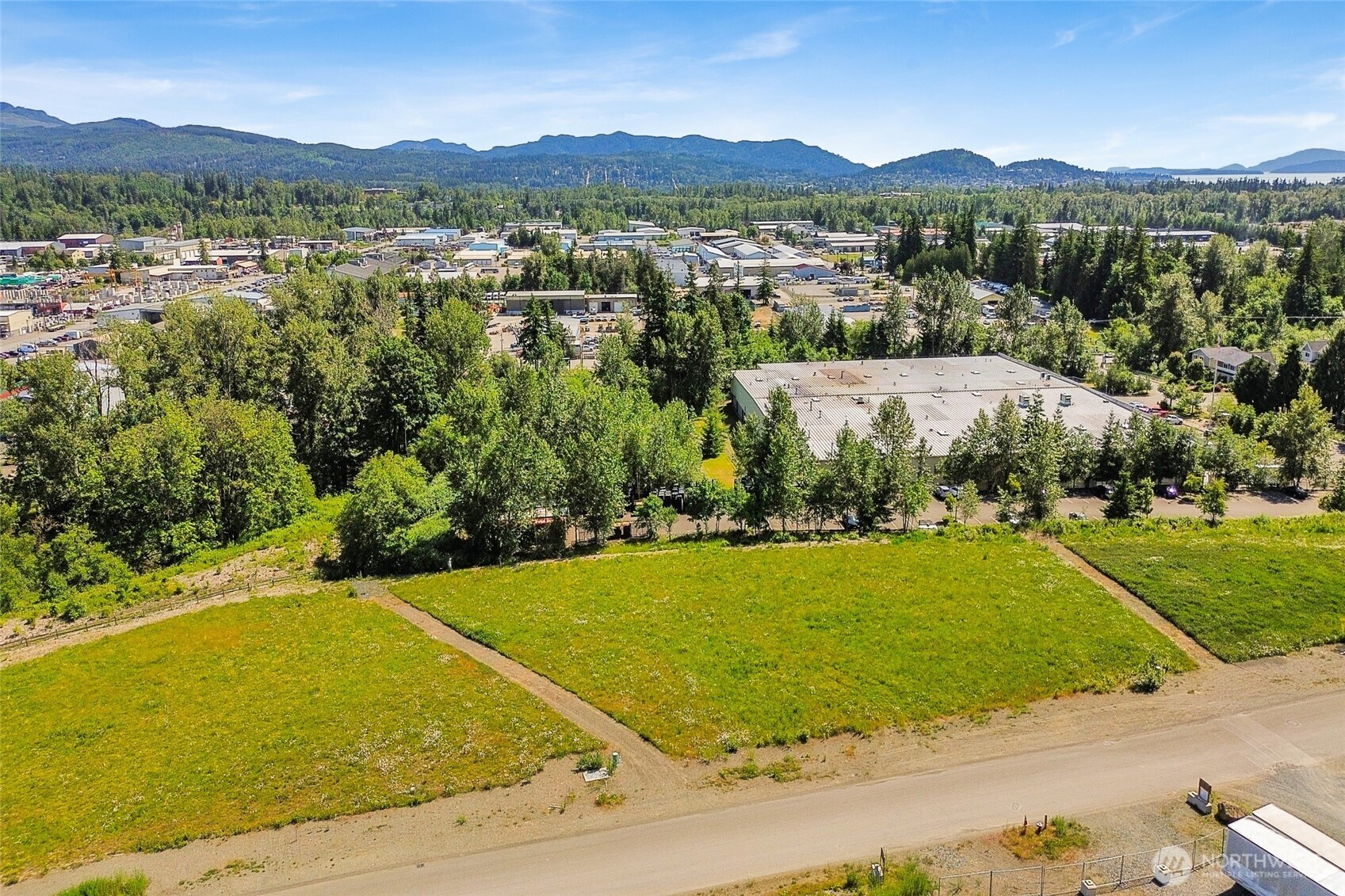 4122 Iron Gate Road Bellingham, WA 98226 - Photo 2 of 15 a view of a city with mountains in the background