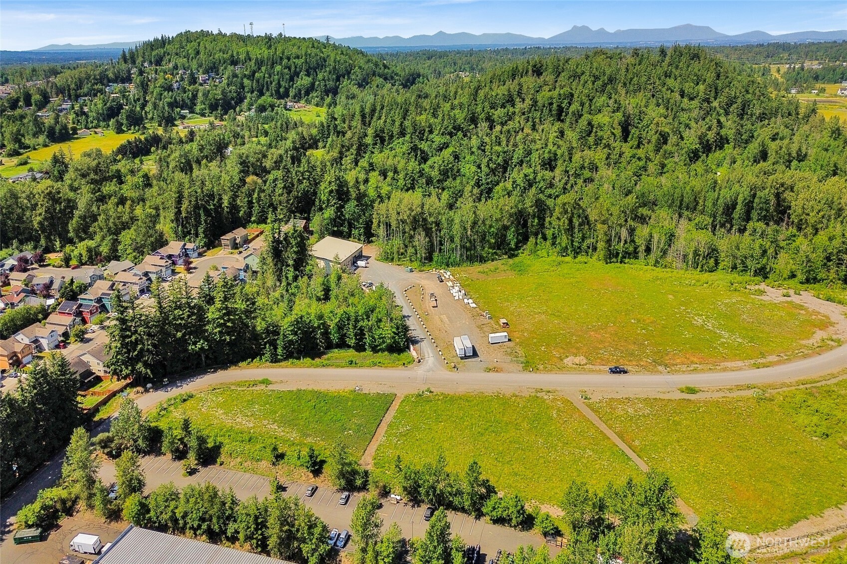 4122 Iron Gate Road Bellingham, WA 98226 - Photo 7 of 15 a view of a swimming pool with an outdoor space and seating area