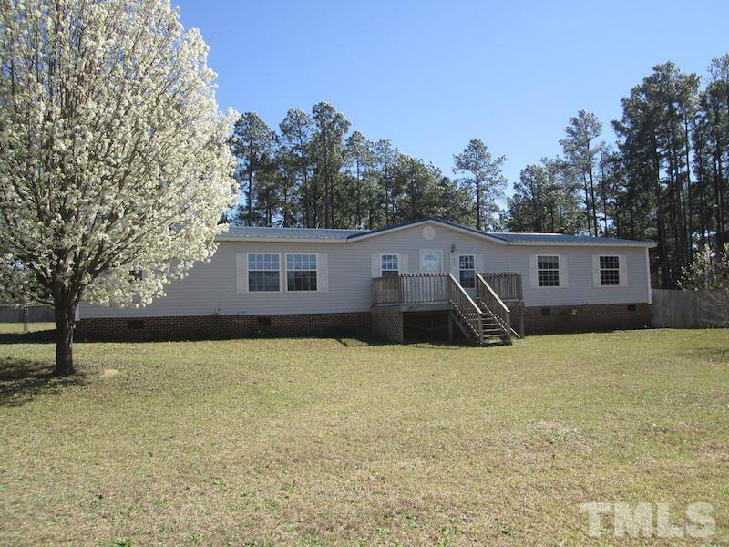 507 Line Road Cameron, NC 28326 - Photo 1 of 11 a house that has a big yard