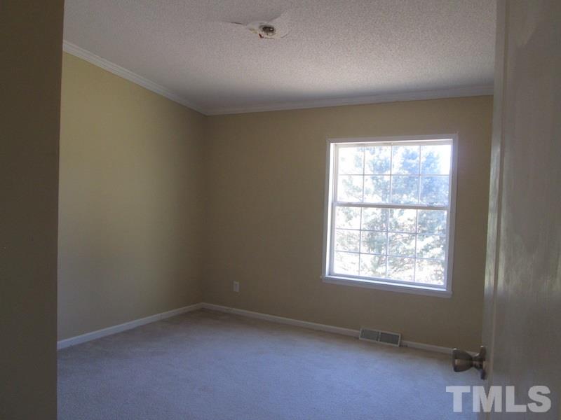 507 Line Road Cameron, NC 28326 - Photo 2 of 11 an empty room with a window