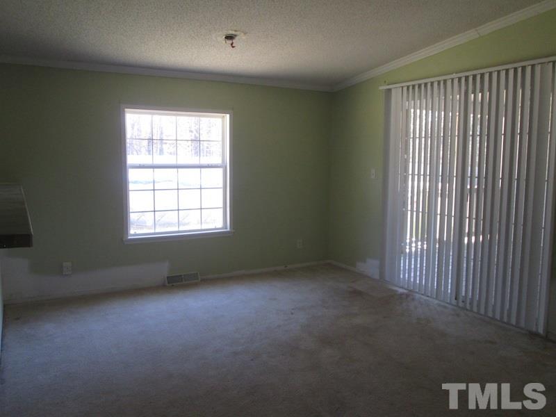 507 Line Road Cameron, NC 28326 - Photo 6 of 11 an empty room with a window