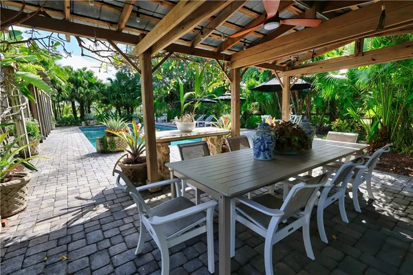 a view of yard with patio