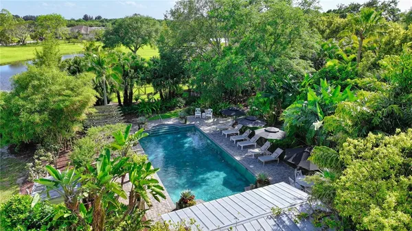 a view of a garden with a lake