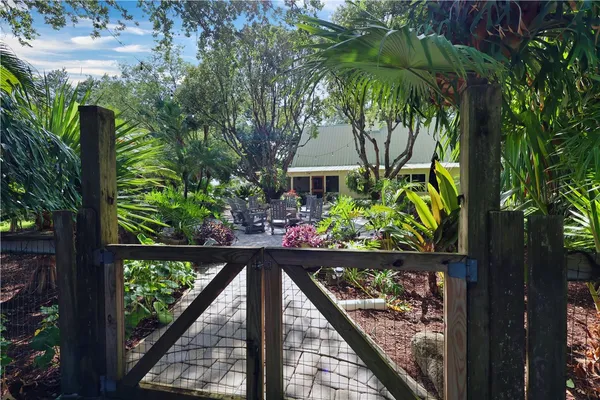 a view of a small yard from a balcony