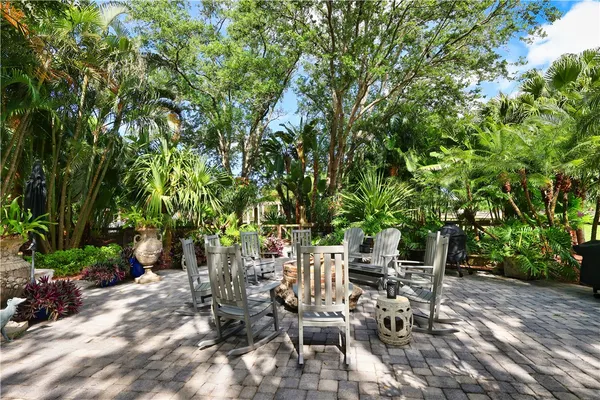 a view of yard with patio