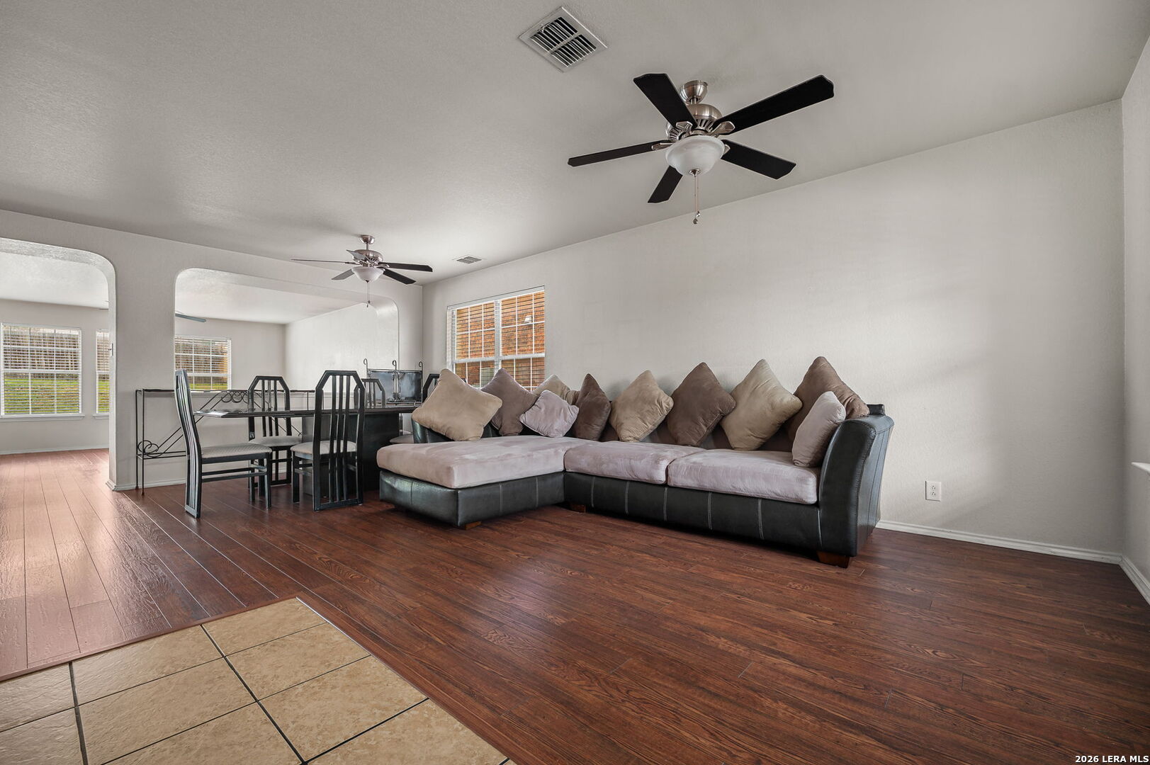 7207 Avery Road Live Oak, TX 78233 - Photo 6 of 32 a living room with furniture and a wooden floor