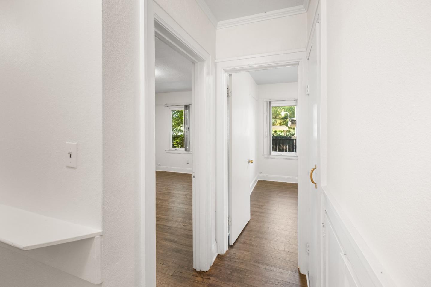 2905 Garfield Avenue Carmichael, CA 95608 - Photo 21 of 32 a view of a hallway with wooden floor