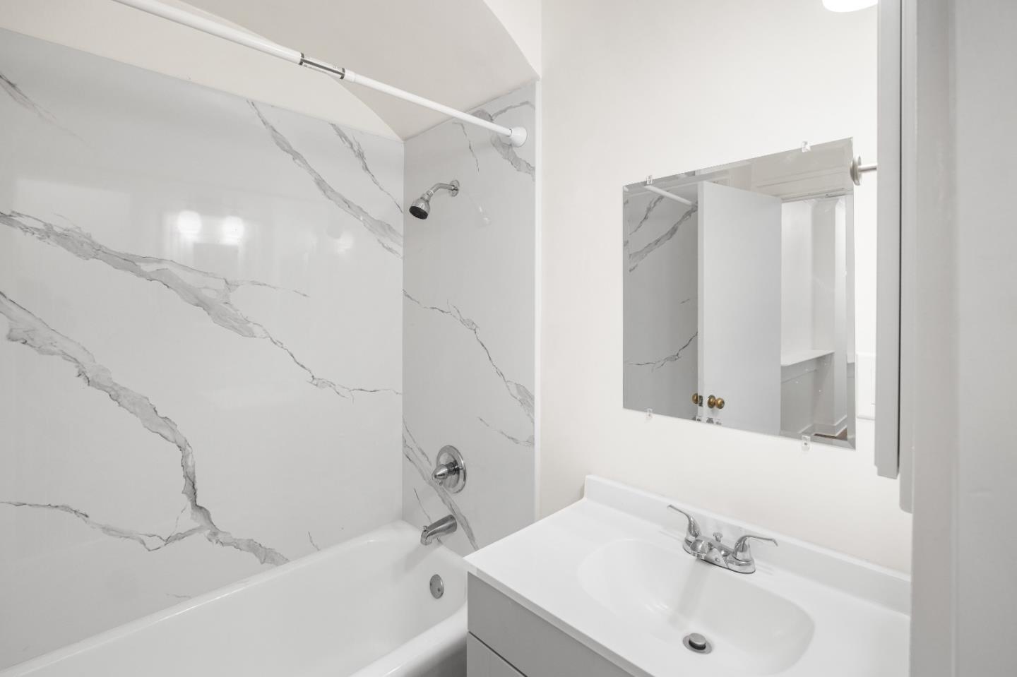 2905 Garfield Avenue Carmichael, CA 95608 - Photo 24 of 32 a bathroom with a sink and a mirror