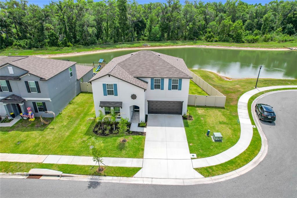 1633 Red Loop Lakeland, FL 33801 - Photo 57 of 60 a view of a house with a swimming pool