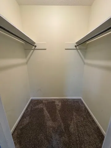 a view of a room with rack on the wall