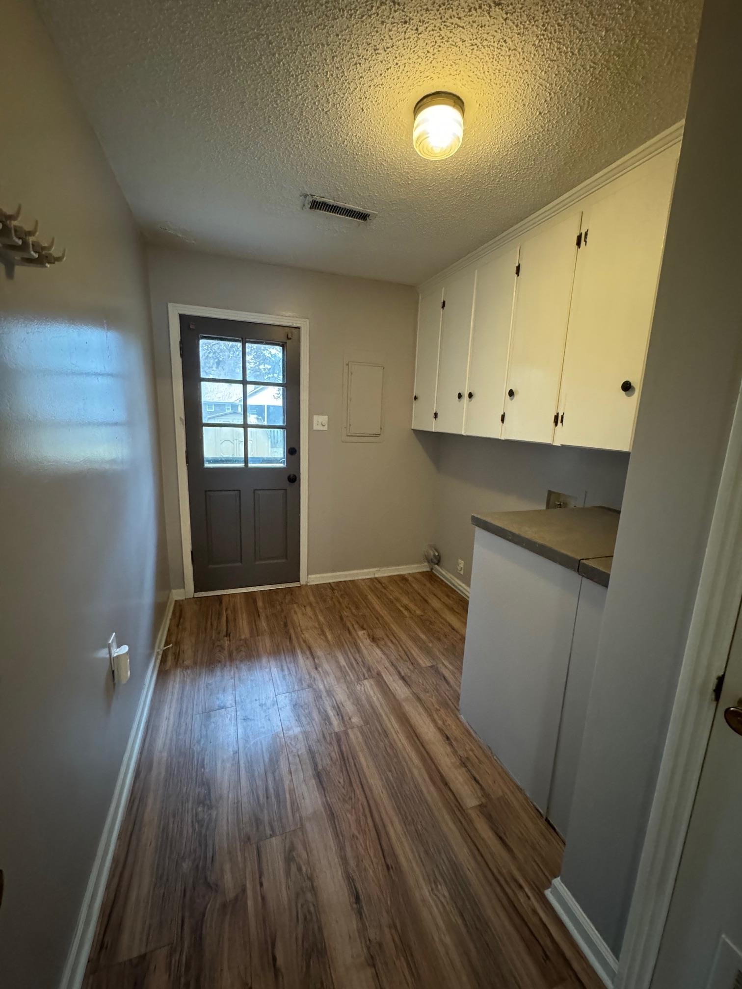 1519 Walters Street Covington, TN 38019 - Photo 14 of 15 wooden floor in an empty room