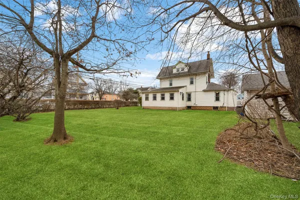 a view of a house with a back yard