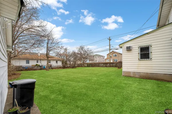 a view of backyard of house garage