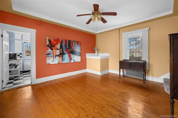 a view of livingroom with hardwood floor and furniture