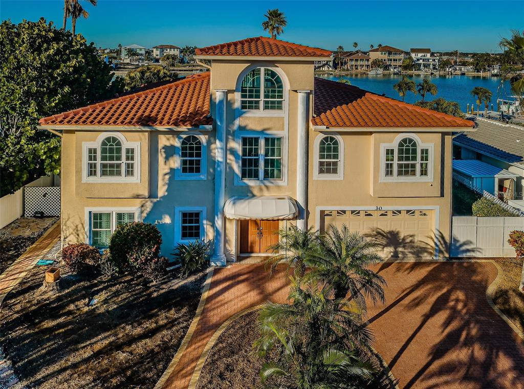 30 Dolphin Drive Treasure Island, FL 33706 - Photo 2 of 71 a front view of a house