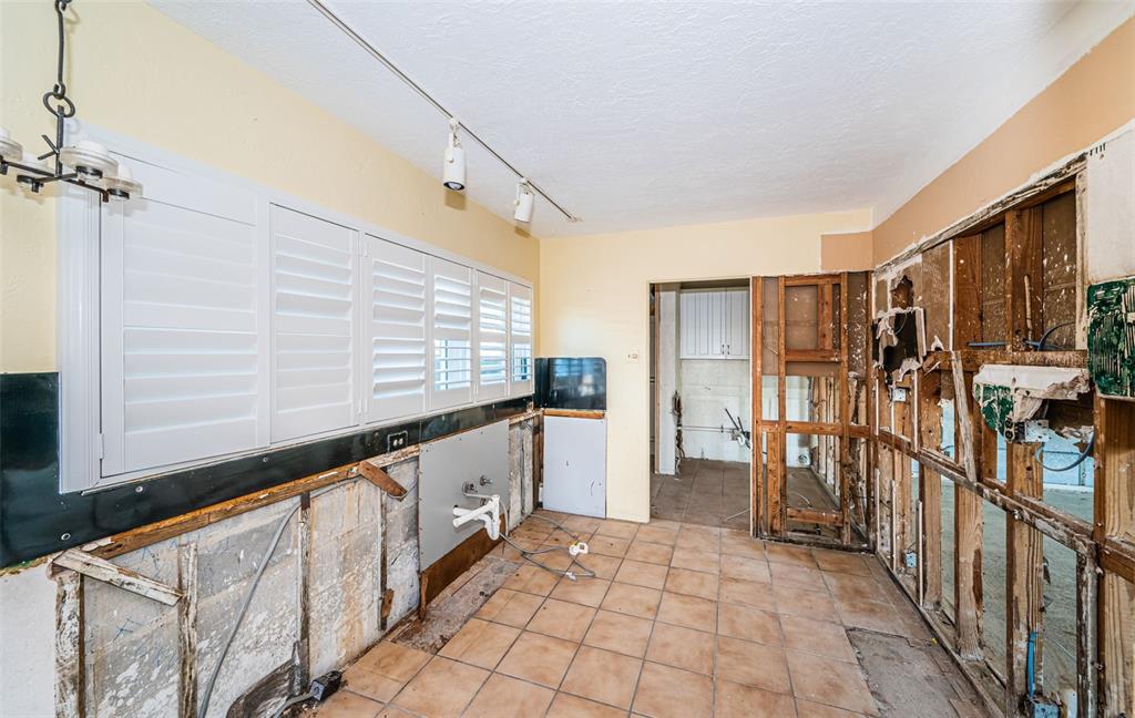 30 Dolphin Drive Treasure Island, FL 33706 - Photo 21 of 71 a view of a hallway with stairs