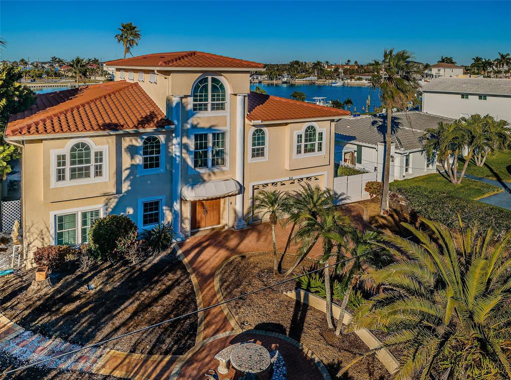 30 Dolphin Drive Treasure Island, FL 33706 - Photo 3 of 71 a front view of a house