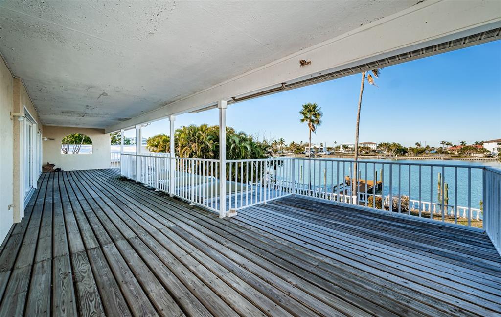 30 Dolphin Drive Treasure Island, FL 33706 - Photo 36 of 71 a view of balcony with wooden floor