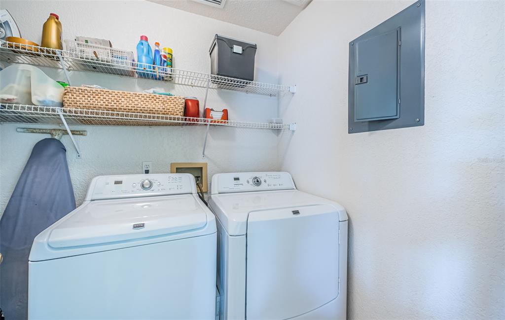 30 Dolphin Drive Treasure Island, FL 33706 - Photo 44 of 71 a utility room with dryer and washer