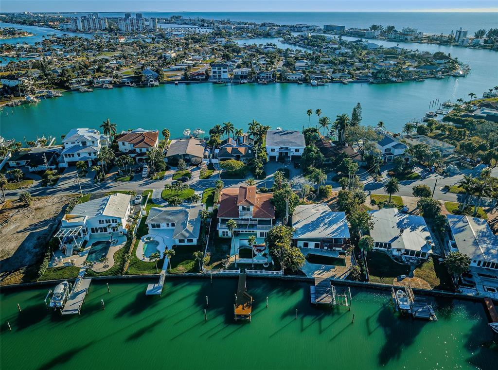 30 Dolphin Drive Treasure Island, FL 33706 - Photo 69 of 71 an aerial view of a houses with outdoor space and lake view
