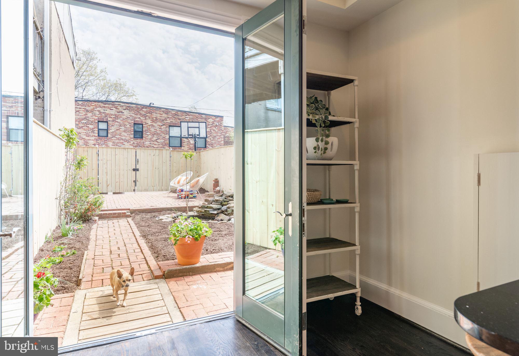 320 12th Street Southeast Washington, DC 20003 - Photo 9 of 20 French doors open onto large lot