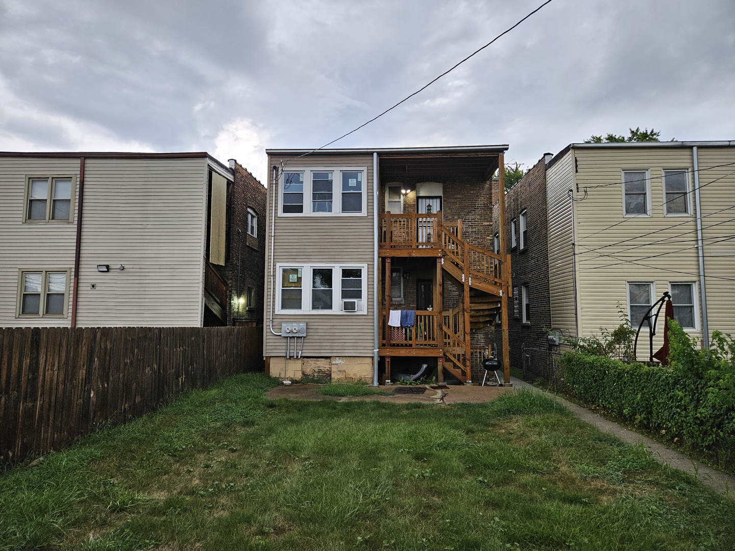 8342 South Wabash Avenue Chicago, IL 60619 - Photo 4 of 5 a view of a house with backyard and porch