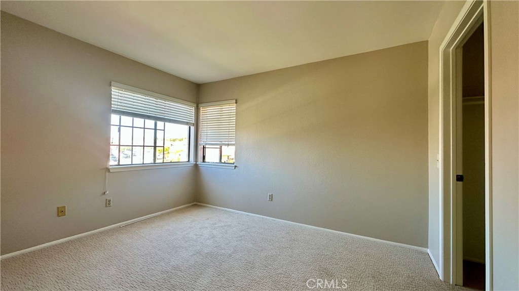 19526 Turtle Ridge Lane Porter Ranch, CA 91326 - Photo 18 of 27 an empty room with windows