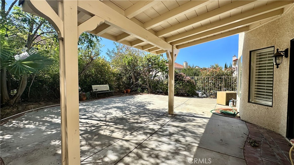 19526 Turtle Ridge Lane Porter Ranch, CA 91326 - Photo 20 of 27 a view of a patio with a yard