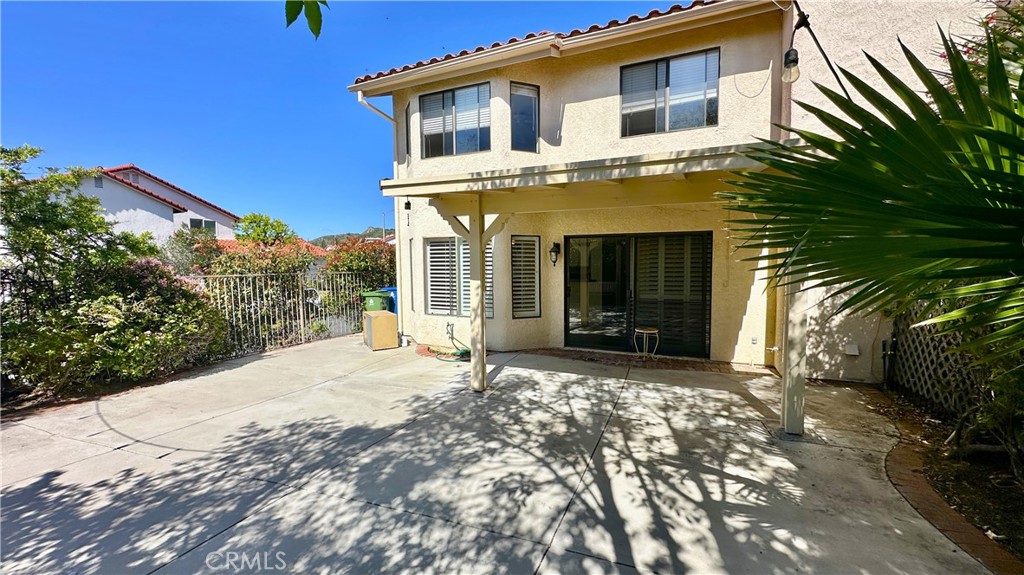 19526 Turtle Ridge Lane Porter Ranch, CA 91326 - Photo 22 of 27 a front view of a house with yard
