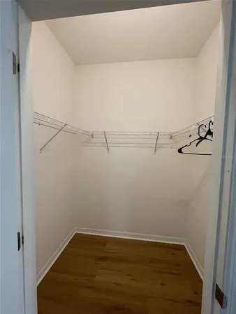a view of a room with racks on the wall