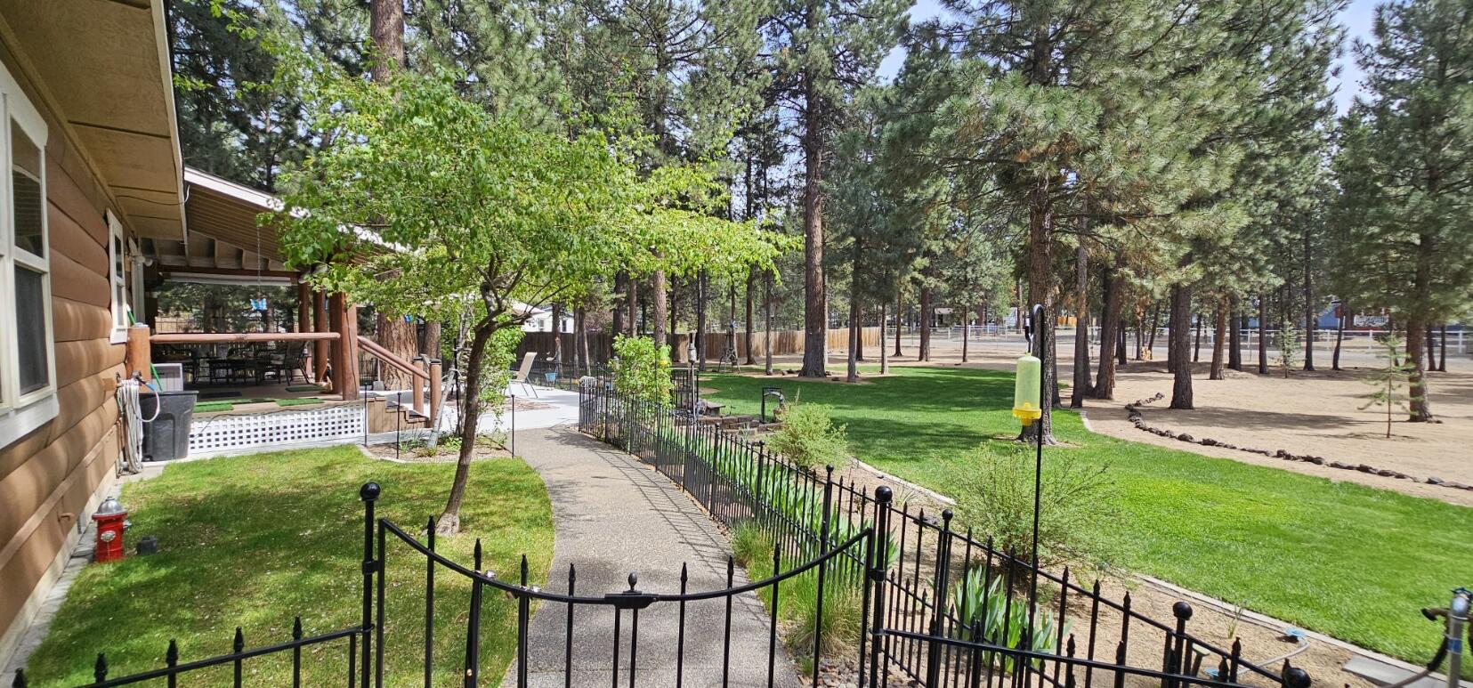 17659 Rosland Road La Pine, OR 97739 - Photo 2 of 33 a view of a house with backyard and a tree