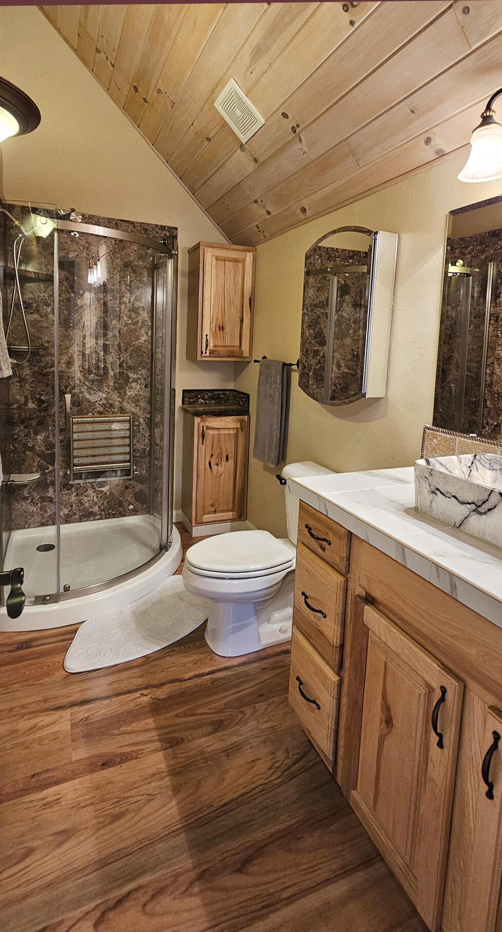 17659 Rosland Road La Pine, OR 97739 - Photo 21 of 33 a bathroom with a granite countertop sink mirror vanity and toilet