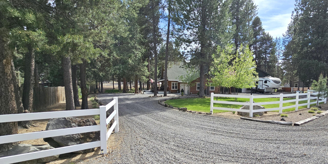 17659 Rosland Road La Pine, OR 97739 - Photo 23 of 33 a view of backyard with swimming pool and sitting area