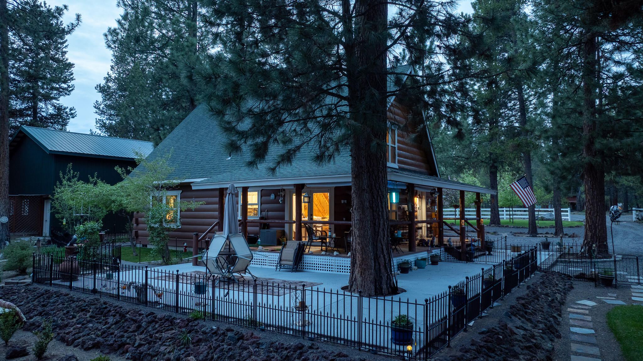 17659 Rosland Road La Pine, OR 97739 - Photo 32 of 33 a view of house with a backyard and balcony
