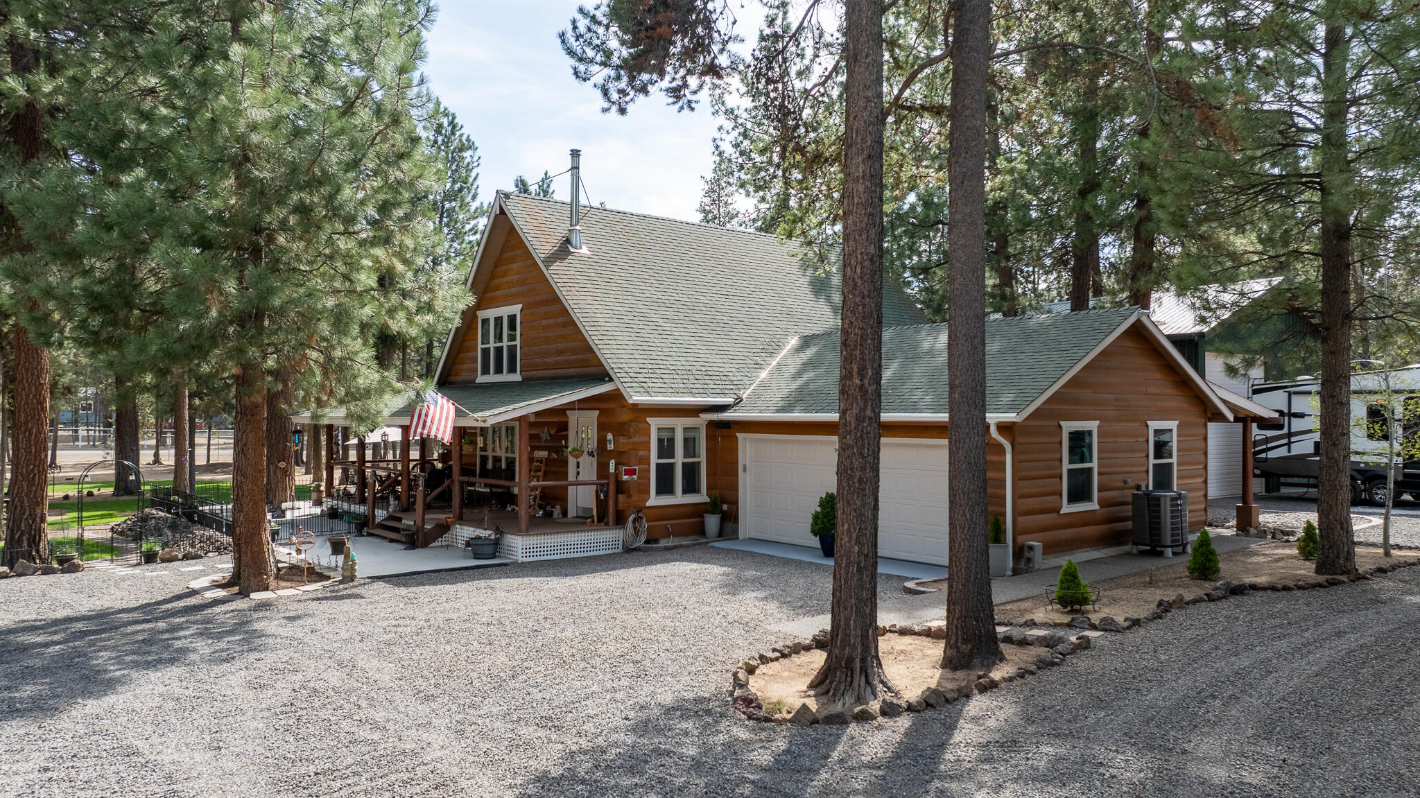17659 Rosland Road La Pine, OR 97739 - Photo 5 of 33 a view of a house with a yard and sitting area
