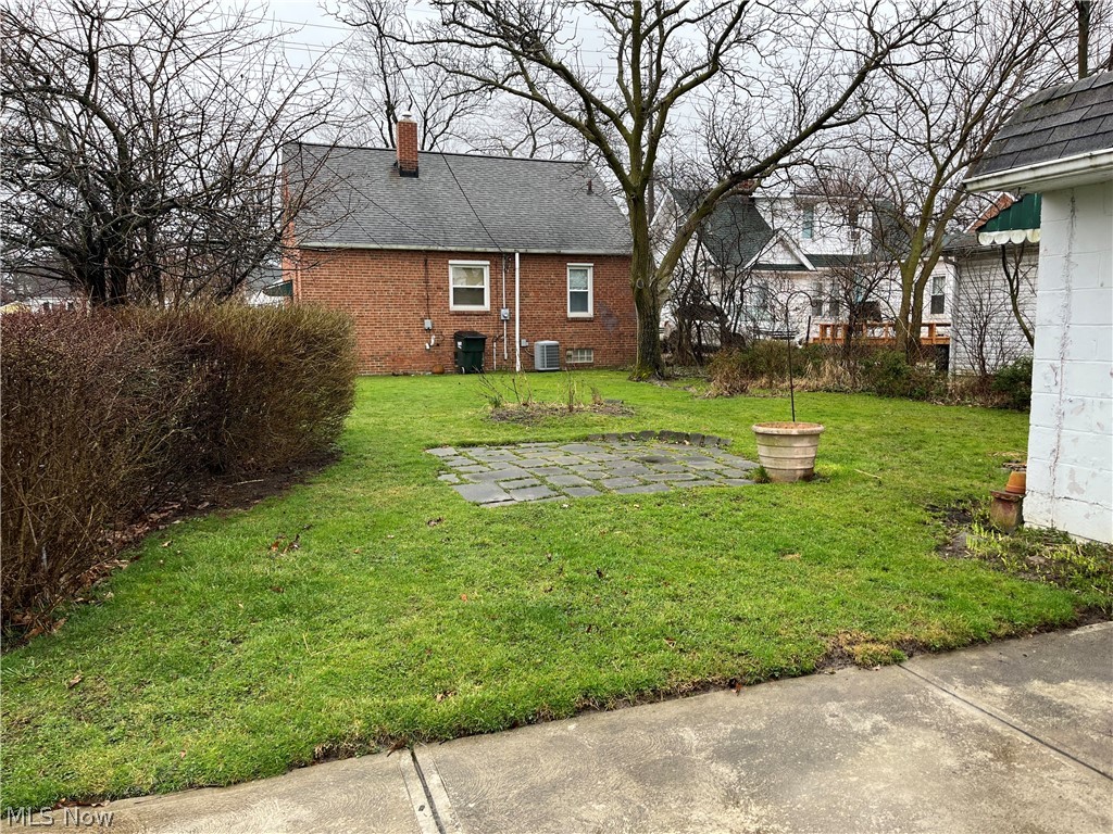 1624 Lander Road Cleveland, OH 44124 - Photo 3 of 21 View of yard featuring central air condition unit