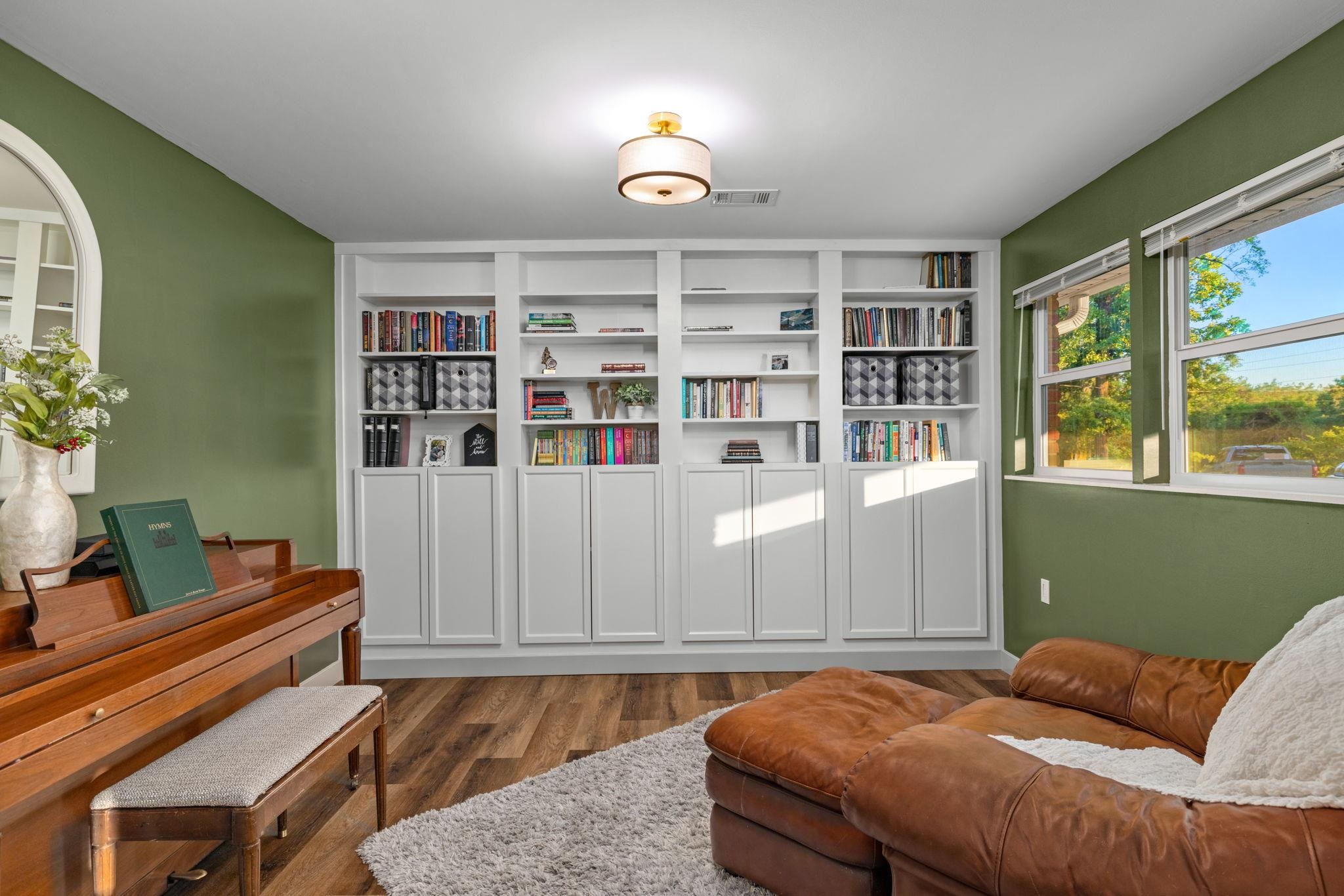 66 County Road 511 Corinth, MS 38834 - Photo 13 of 40 Built-in shelving with lower cabinetry provides extensive storage