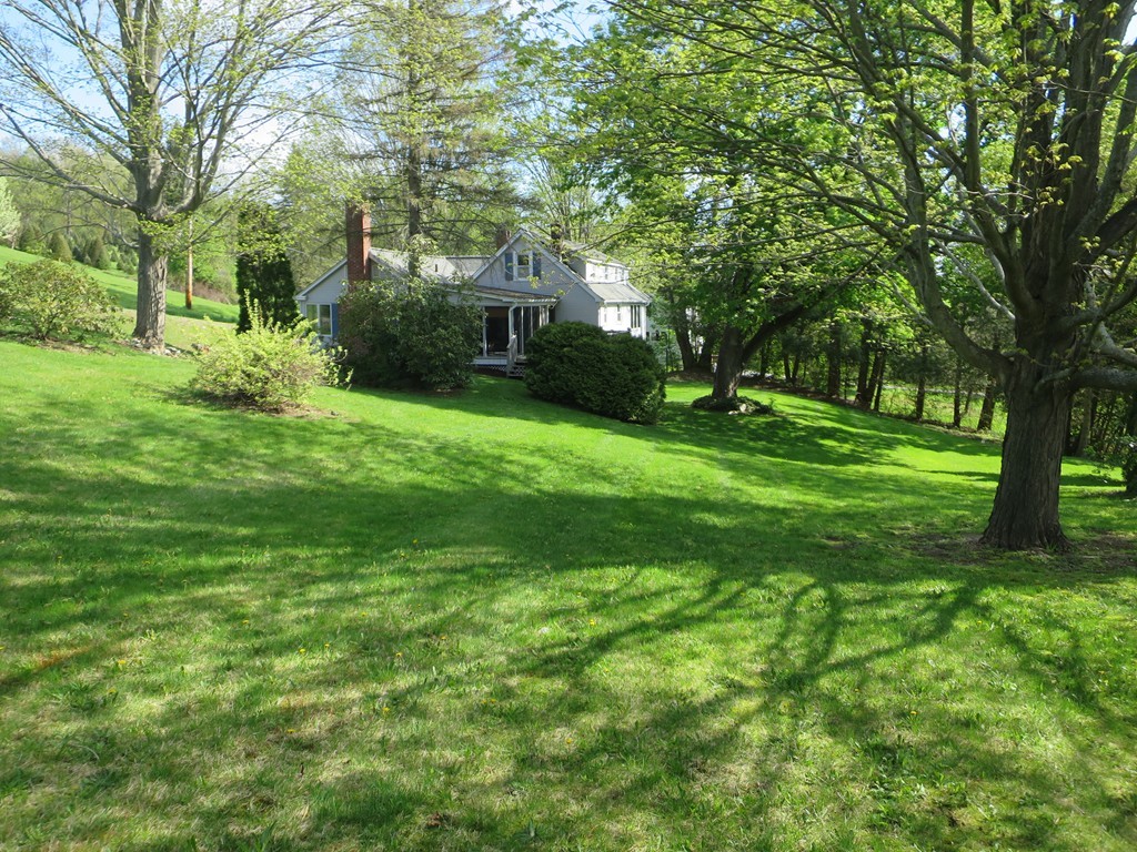 117 Stebbins Road Monson, MA 01057 - Photo 2 of 27 a view of a backyard with large trees