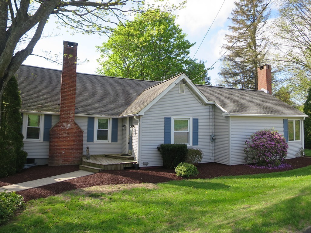 117 Stebbins Road Monson, MA 01057 - Photo 23 of 27 a view of a house with a yard and a garden