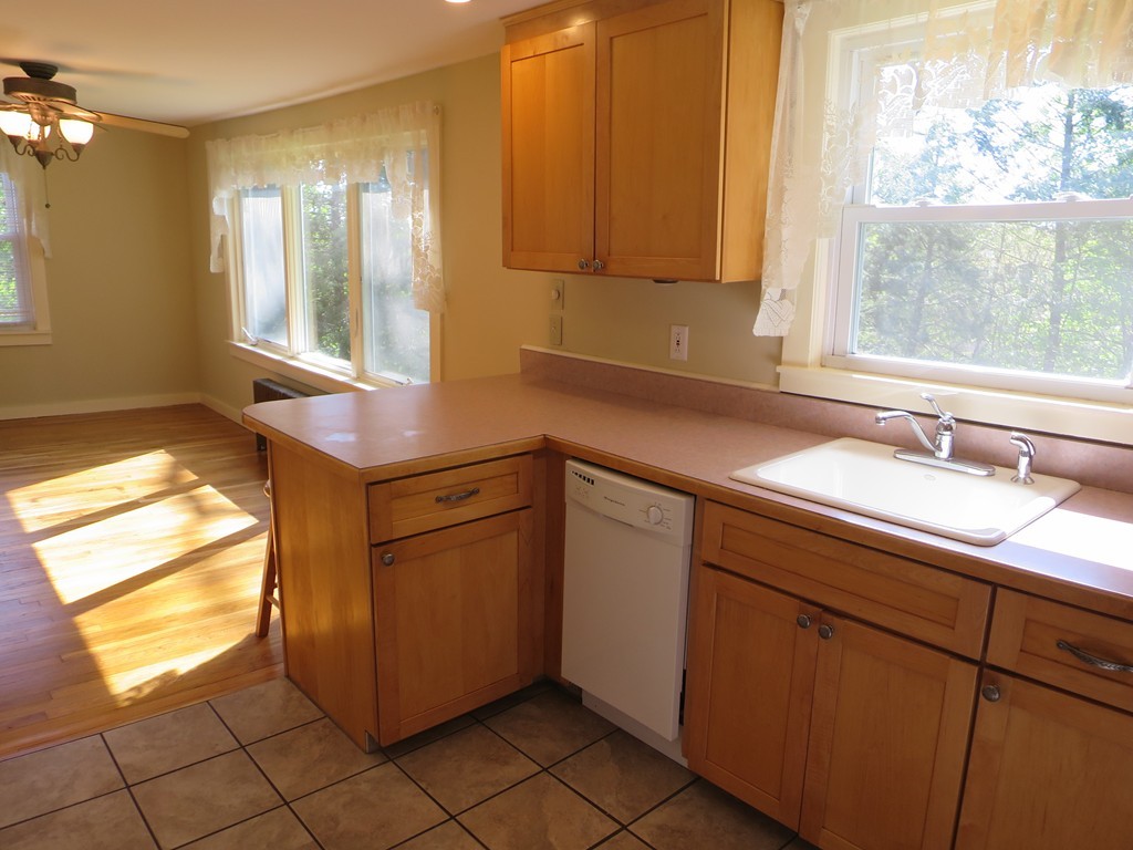 117 Stebbins Road Monson, MA 01057 - Photo 4 of 27 a kitchen with a sink cabinets and window