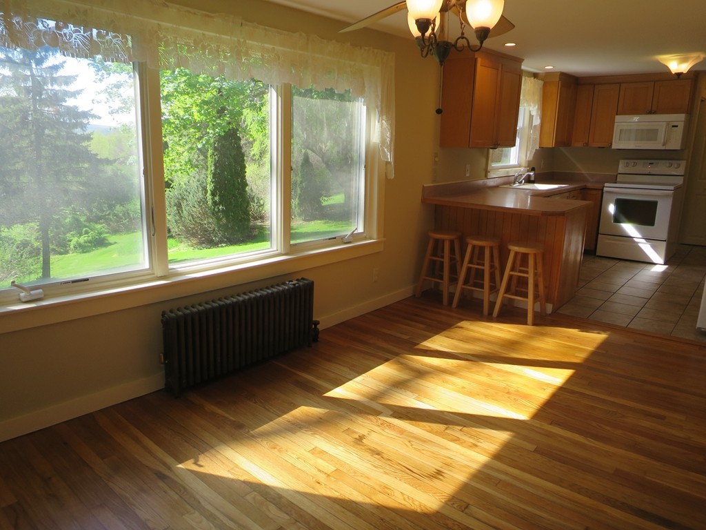 117 Stebbins Road Monson, MA 01057 - Photo 5 of 27 a view of kitchen with furniture and large windows