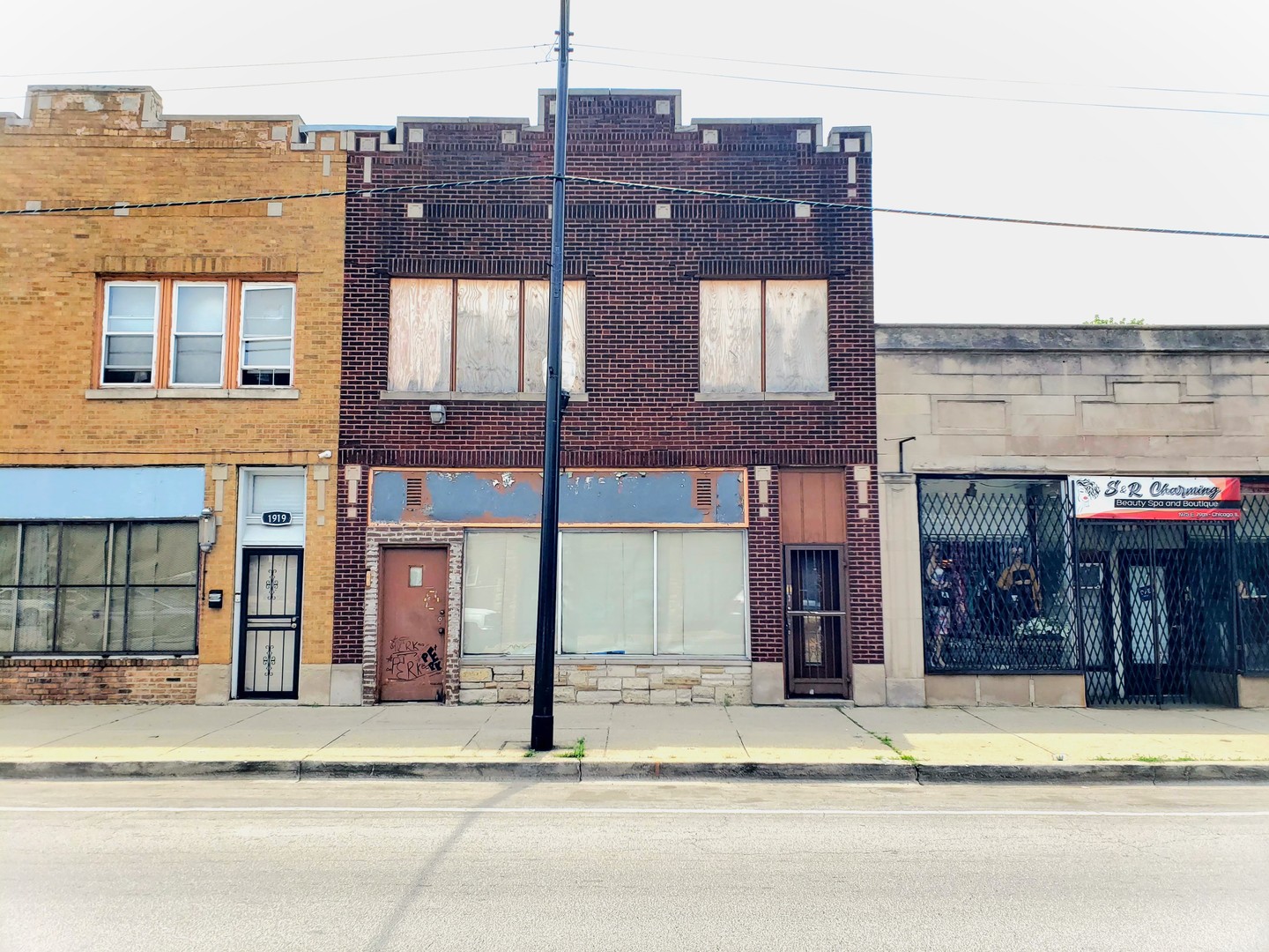 a view of a building on a street