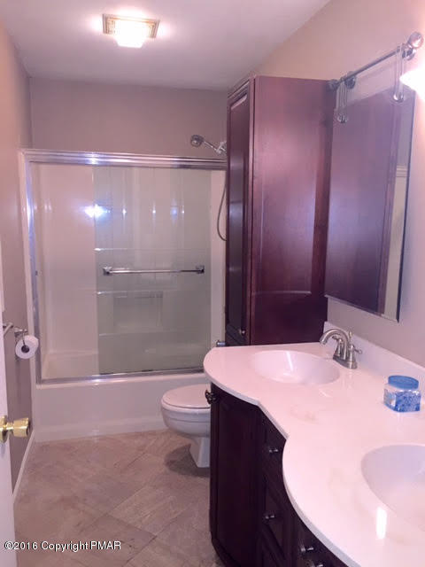 123 Bromley Road Henryville, PA 18332 - Photo 23 of 32 a bathroom with a sink a toilet and shower