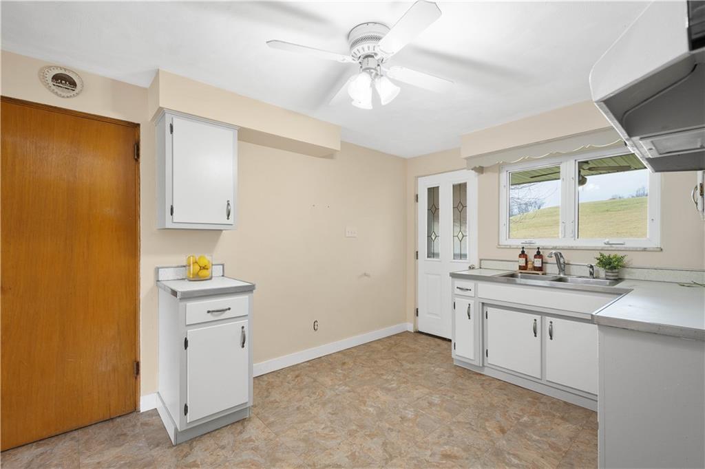36 Swihart Road Canonsburg, PA 15317 - Photo 20 of 37 a view of a kitchen with a sink and a window